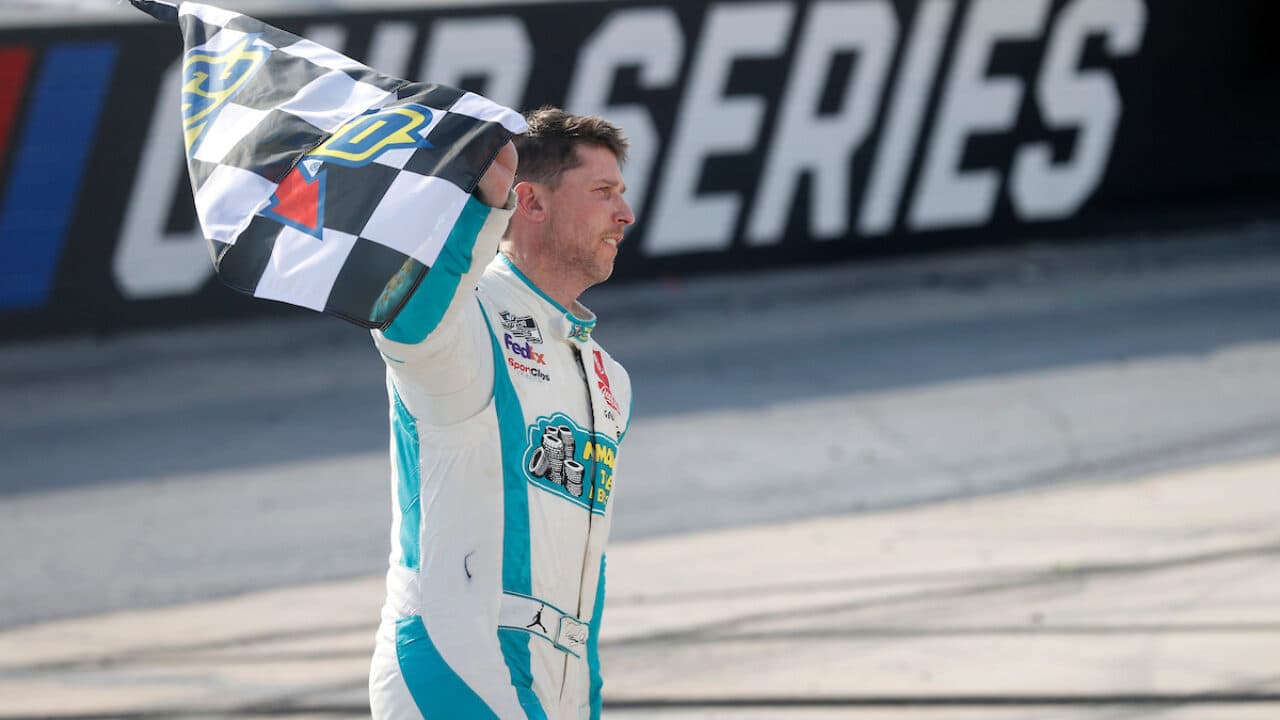 hero image for Denny Hamlin Holds Off Kyle Larson for Third Win of 2024