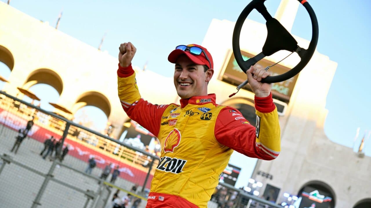 hero image for Joey Logano Outduels Kyle Busch to Win Coliseum Clash