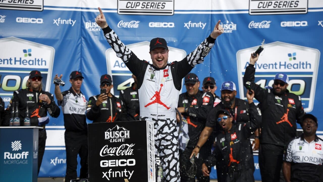 hero image for Kurt Busch Outduels Kyle Larson for Dramatic Kansas Win